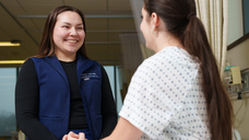 Abbie Tuomisto working with a patient
