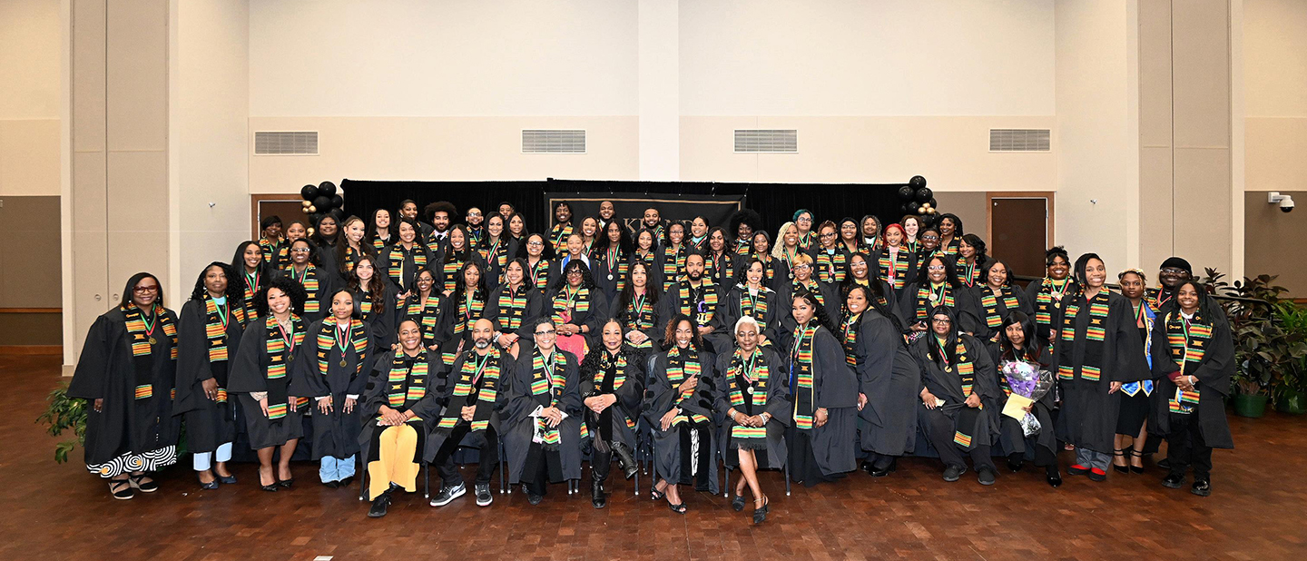 Group of student smiling into camera
