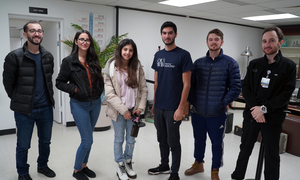 Students pose for a pic in the lobby of World Medical Relief