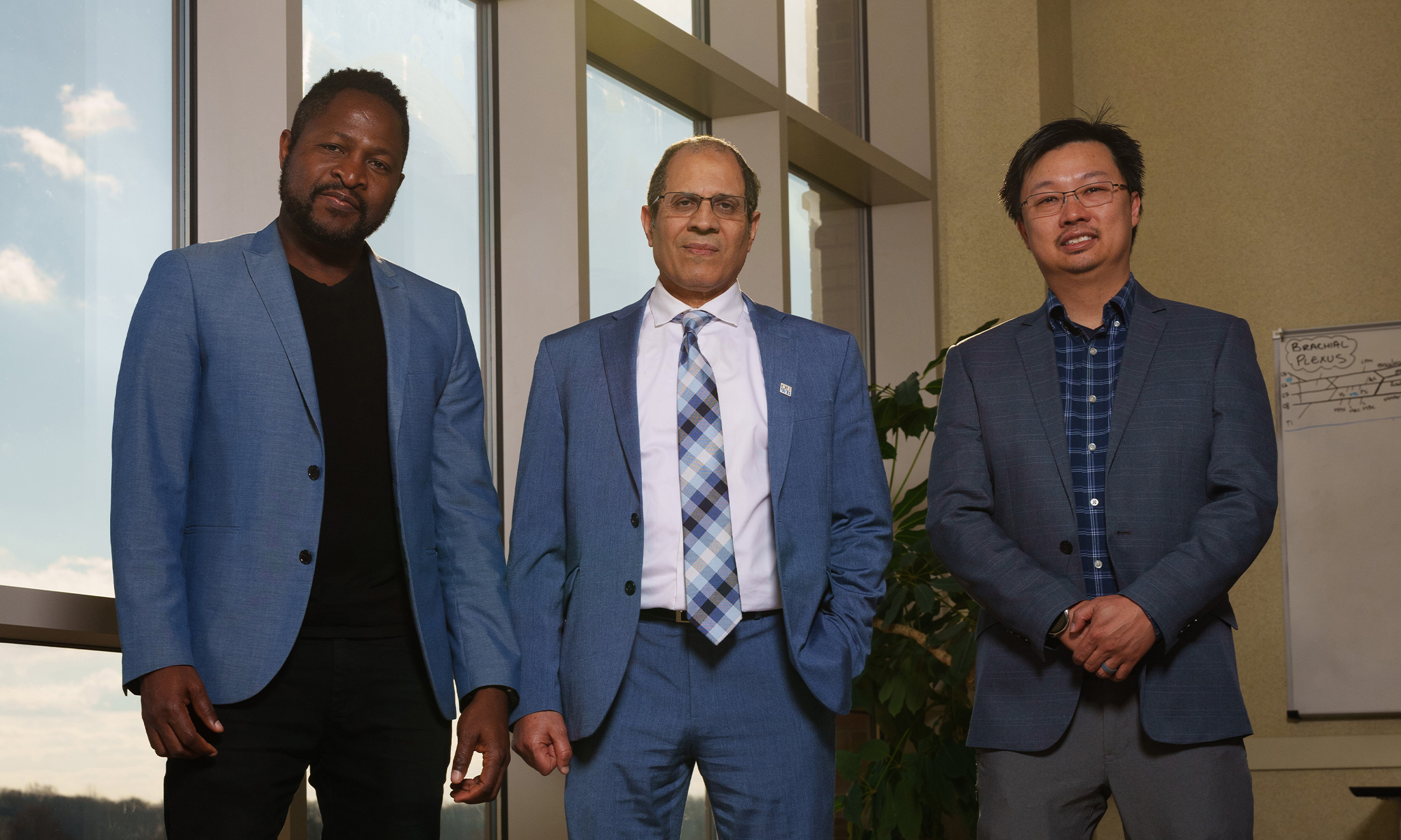 An image of the three researchers working on the project