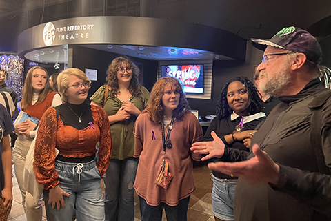 Group of people talking.