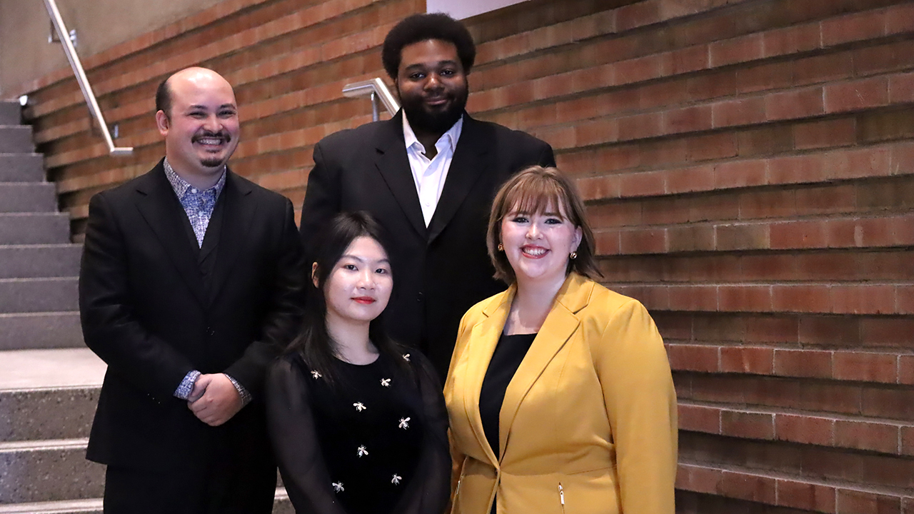 Garret Klauss, Yuhan Wei, Christopher Peters, and Montana King.