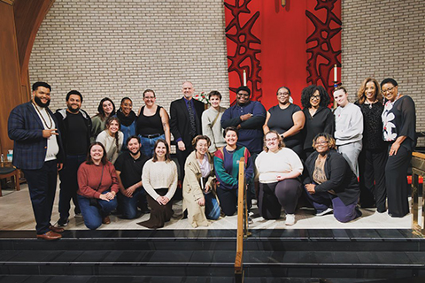 People on stage with instruments