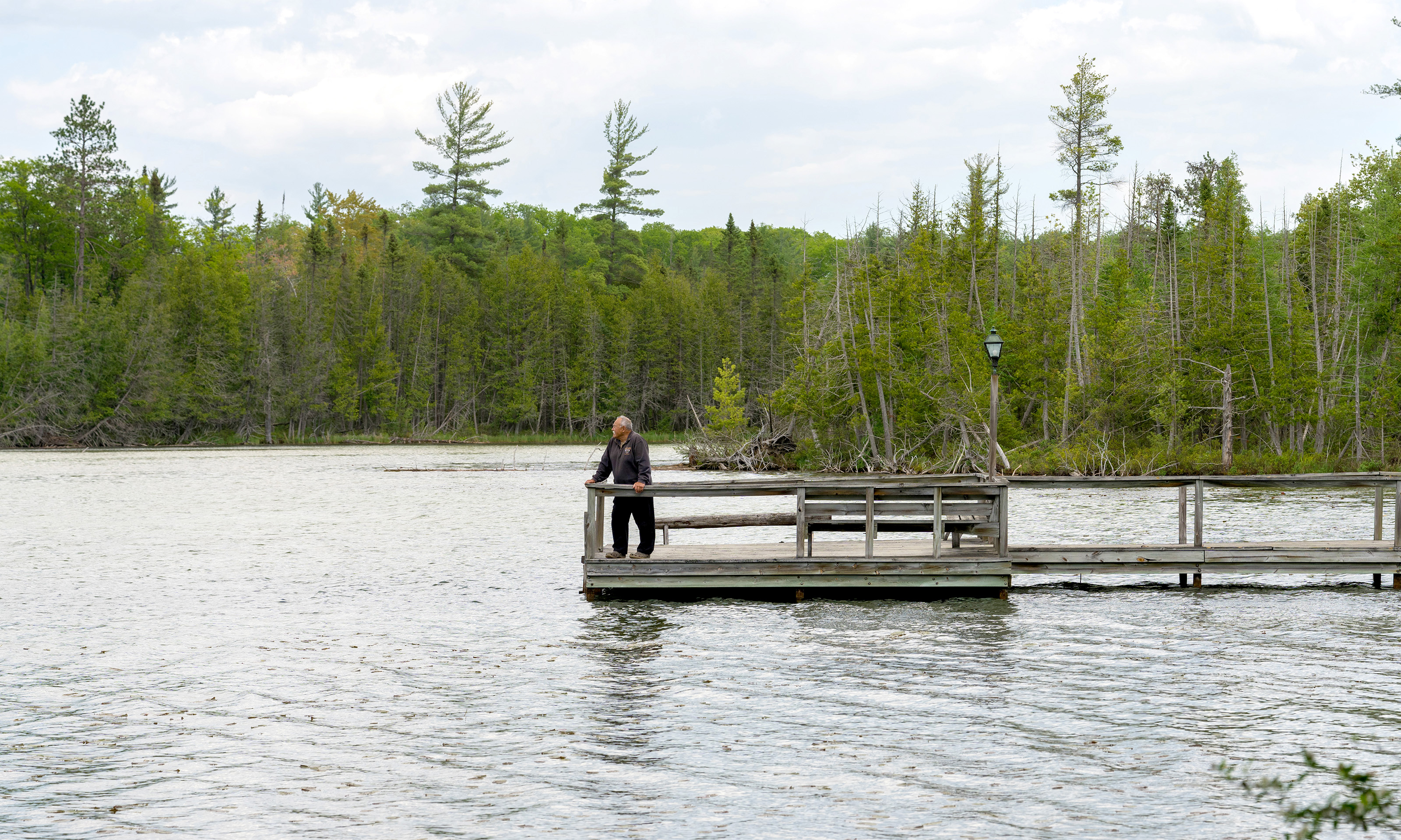 A man standing on a dock