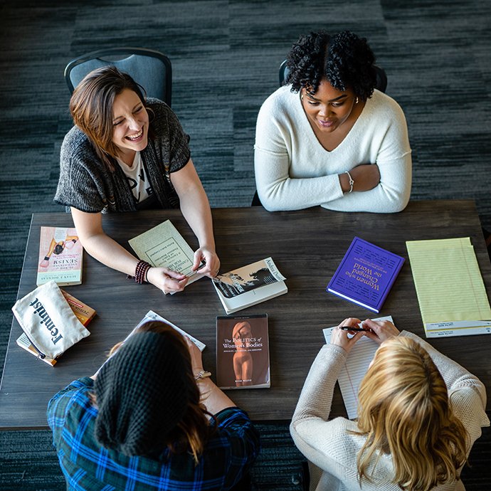 A overhead shot of four people at a table