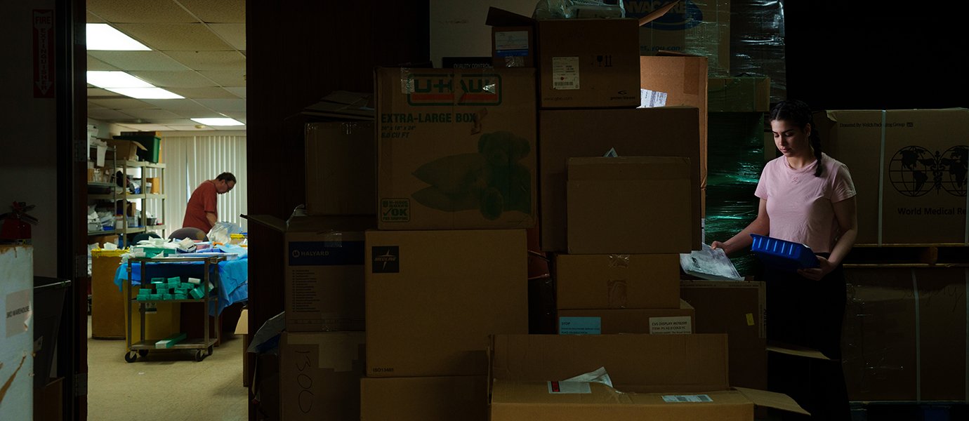 Two people working in different rooms