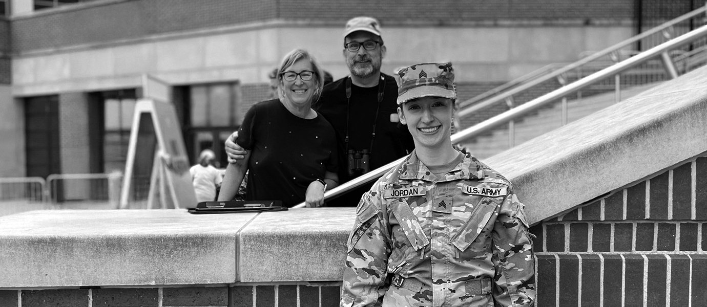 Three people standing together