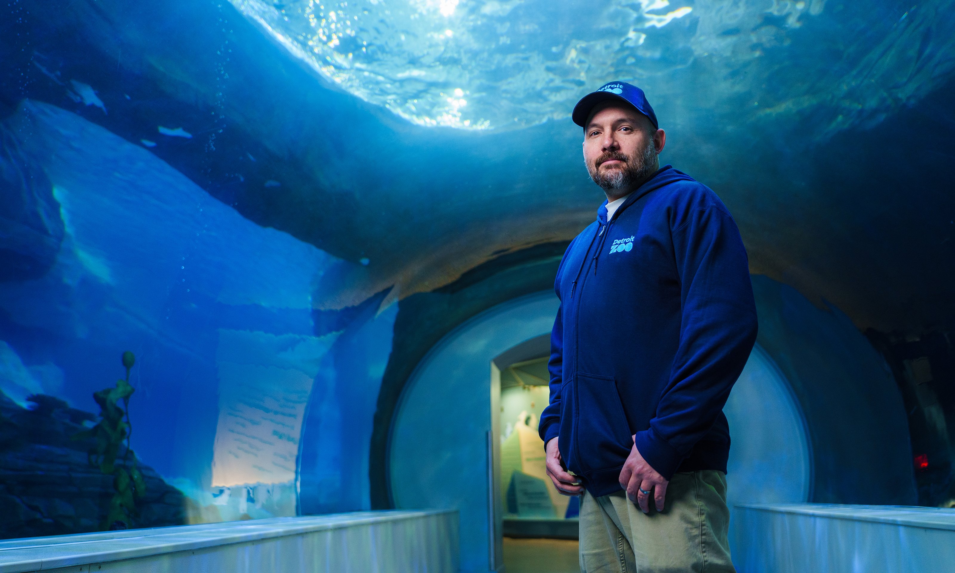 A man standing in an aquarium