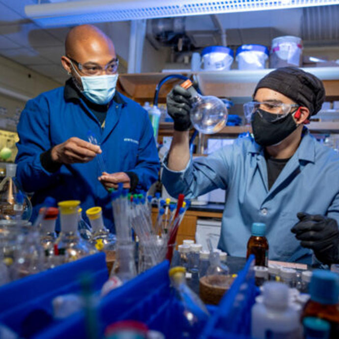 Two people working in lab