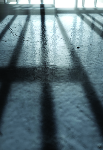 Shadow of prison bars