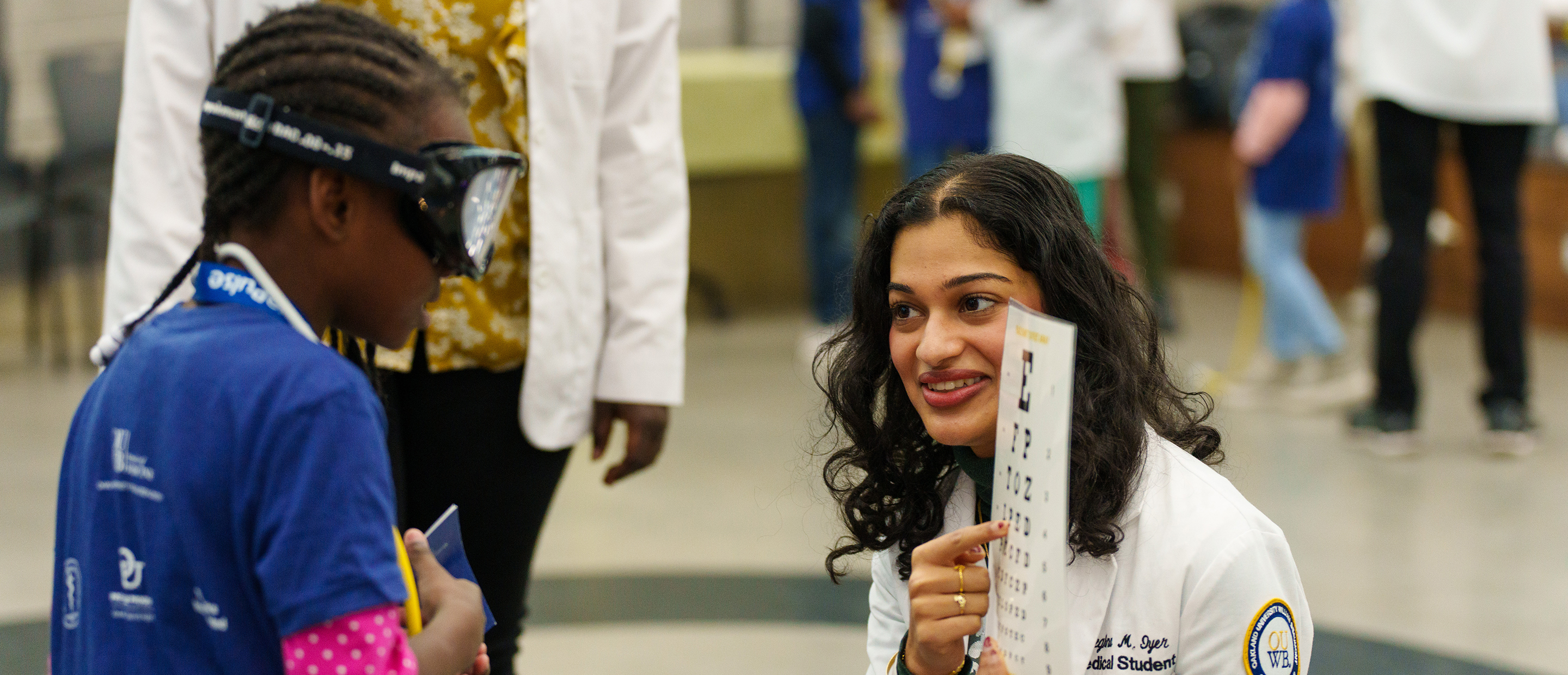 An image of a medical student and patient