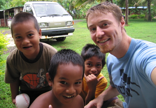 An image of Dr. Brummett and three kids