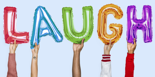 An image of balloon letters spelling the word laugh