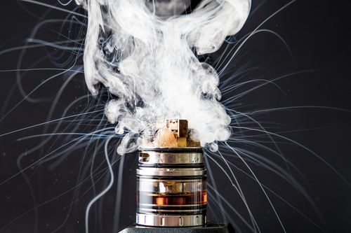An image of an e-cigarette smoking