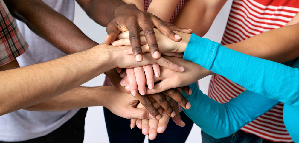 An image of a bunch of hands