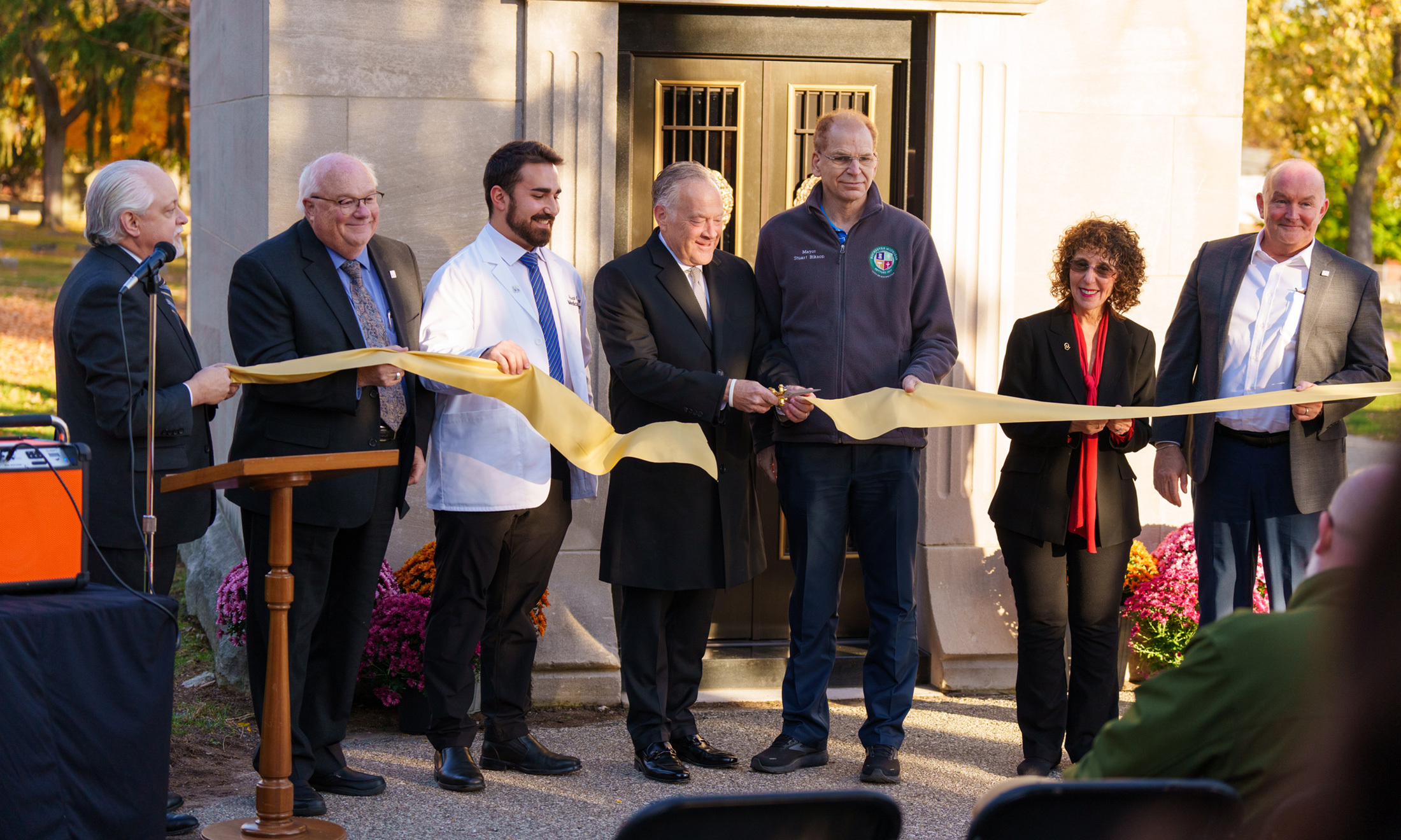An image of officials cutting a ribbon