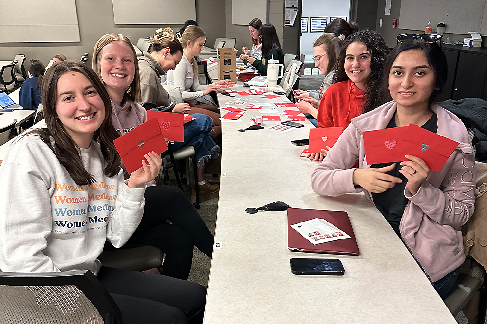 An image of students working on valentines
