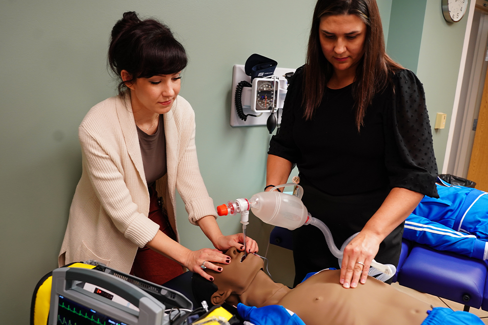 An image of the CSC staff demonstrating a model
