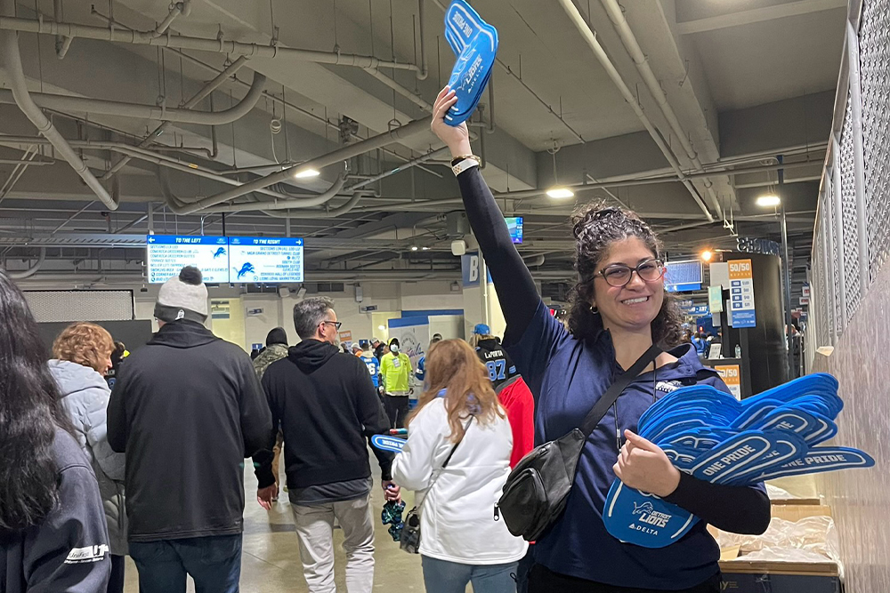 An image of an OUWB student at a Lions game