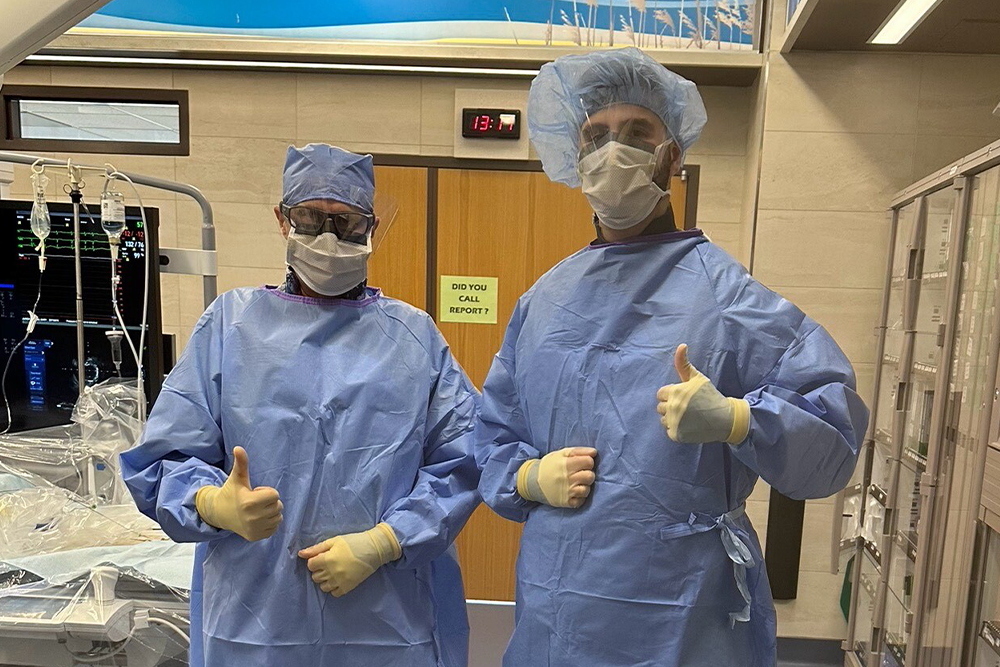 An image of a medical student and a doctor