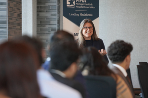 An image of Meghan Groen speaking to OUWB students