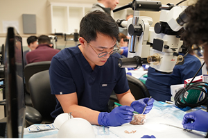 Vincent Le dissects a cow eyeball