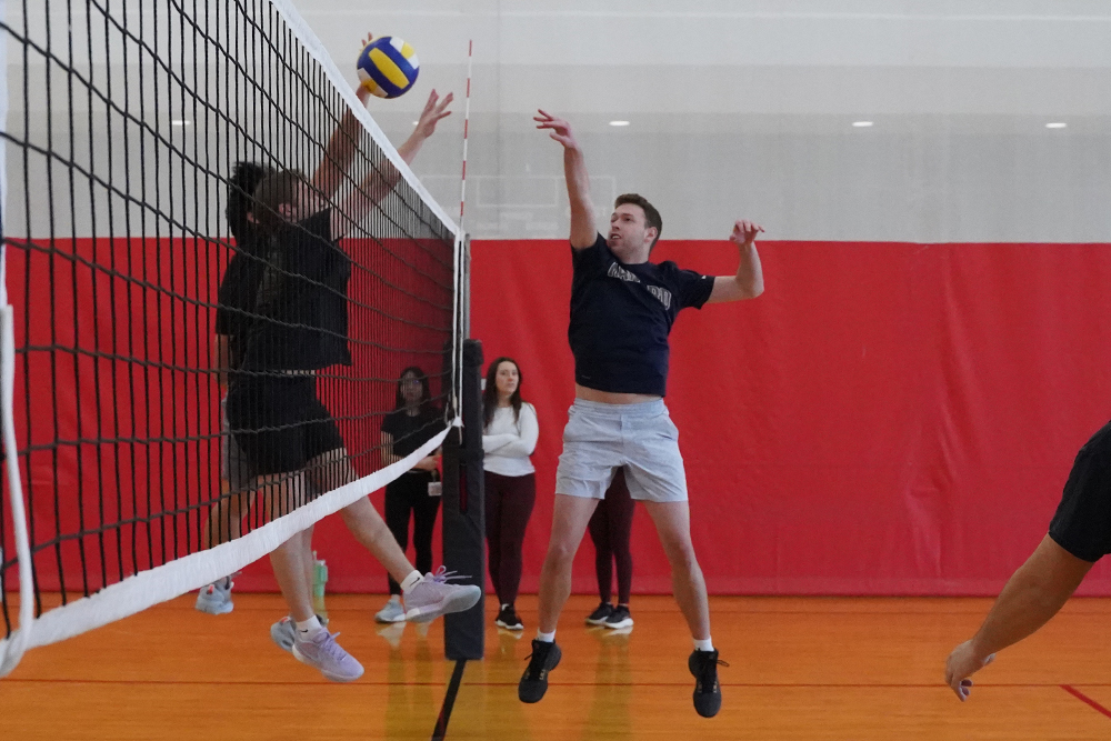 Students playing volleyball