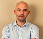 A headshot of Marcos Picchio