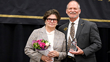 Ewa Matuszewski, MedNetOne founder/CEO and SHS Board member, receiving an award from the SHS Dean