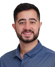 A headshot of Hassan Ghoussaini
