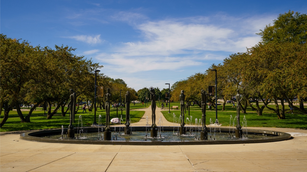statue on campus of oakland university called saints and sinners