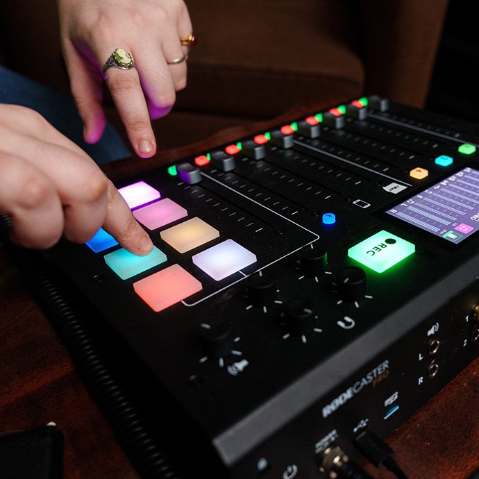 Hands using a soundboard